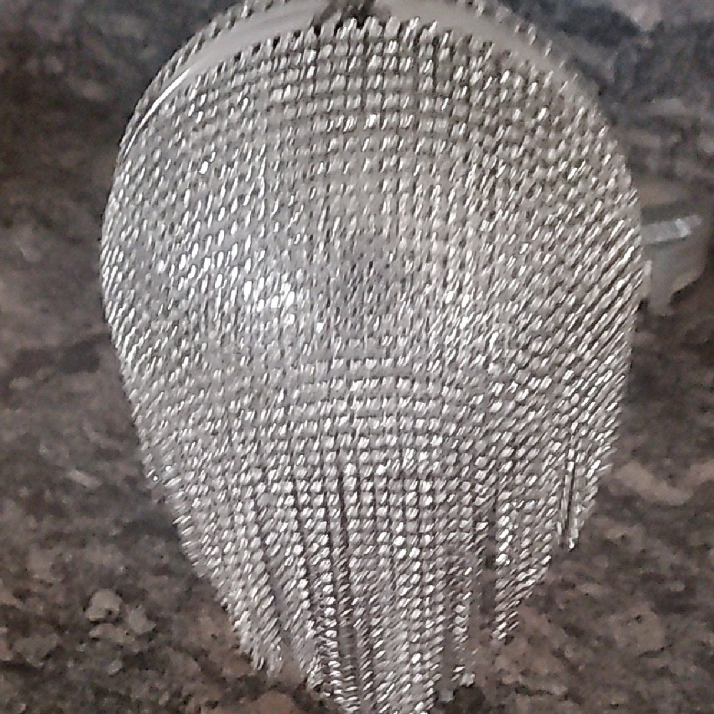 Elegant Silver Fringe Clutch